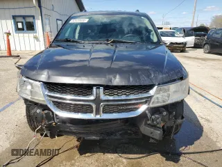 2014 Dodge Journey Limited with VIN 3C4PDDDG4ET202173, listed as a Copart auction lot 52020835 with 124,624 mi miles and Salvage Title. Bid and sale history available at carsss.com. Image 5.
