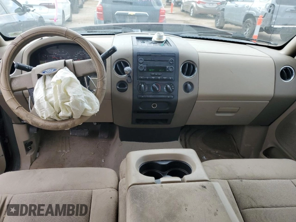 2005 Ford F-150 XL with VIN 1FTPX12595KD30384, listed as a Copart auction lot 77244603 with 170,086 mi miles and Salvage title. Bid and sale history available at DreamBid. Image 8.