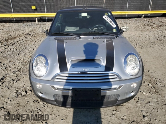 2007 MINI Convertible S с VIN WMWRH33547TJ44603, выставлен на аукционе Copart как лот 48715045 с пробегом 76 561 миль миль и Списание • Salvage title. История ставок и продаж доступна на DreamBid. Изображение 5.