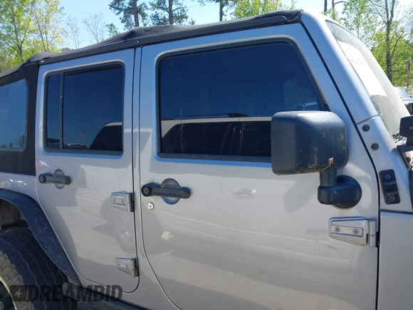 2014 Jeep Wrangler Unlimited Sport with VIN 1C4BJWDG4EL292421, listed as a IAAI auction lot 42034343 with 157,820 mi miles. Bid and sale history available at carsss.com. Image 13.