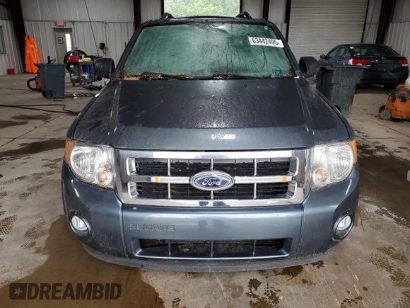 2012 Ford Escape XLT z VIN 1FMCU9D75CKA05373, wystawiony jako Copart lot #63442495 z przebiegiem 117 756 mil mil oraz Szkoda całkowita • Salvage title. Historia ofert i sprzedaży dostępna na DreamBid. Obrazek 5.