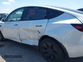 2024 Tesla Model Y with VIN 7SAYGDED0RA327806, listed as a IAAI auction lot 42096752 with 13,244 mi miles and . Bid and sale history available at DreamBid. Image 6.