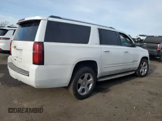 2015 Chevrolet Suburban LTZ with VIN 1GNSKKKC1FR275393, listed as a Copart auction lot 48349675 with 158,542 mi miles and Salvage Title. Bid and sale history available at carsss.com. Image 3.