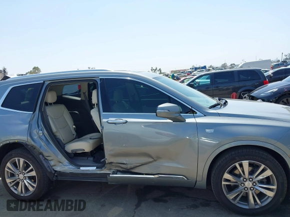 2023 Cadillac XT6 FWD Premium Luxury with VIN 1GYKPCRS6PZ163018, listed as a IAAI auction lot 42437403 with 21,366 mi miles and . Bid and sale history available at DreamBid. Image 14.