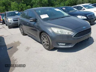 2016 Ford Focus SE with VIN 1FADP3F28GL212201, listed as a IAAI auction lot 42033789 with 148,503 mi miles. Bid and sale history available at carsss.com. Image 1.