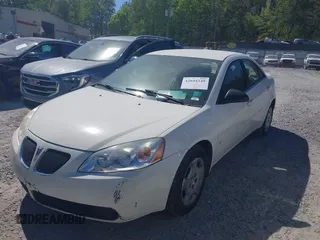 2006 Pontiac G6 6-Cyl z VIN 1G2ZG558264213214, wystawiony jako IAAI lot #42044349 z przebiegiem 138 725 mil mil oraz . Historia ofert i sprzedaży dostępna na DreamBid. Obrazek 2.