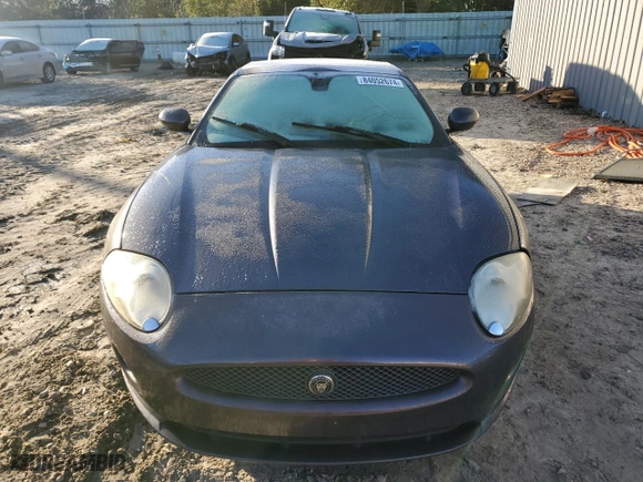 2008 Jaguar XK with VIN SAJWA44B485B23961, listed as a Copart auction lot 84052674 with 209,719 mi miles and Salvage Title. Bid and sale history available at carsss.com. Image 5.