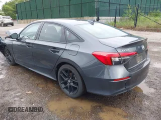 2023 Honda Civic Sport with VIN 2HGFE2F5XPH515699, listed as a IAAI auction lot 42441217 with 44,595 mi miles and . Bid and sale history available at DreamBid. Image 3.