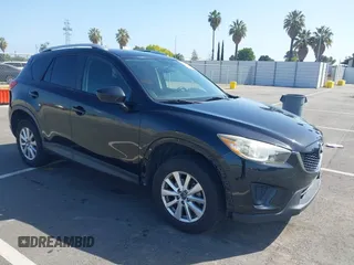 2014 Mazda CX-5 Sport z VIN JM3KE2BE8E0371775, wystawiony jako IAAI lot #42111417 z przebiegiem 150 932 mil mil oraz . Historia ofert i sprzedaży dostępna na DreamBid. Obrazek 1.