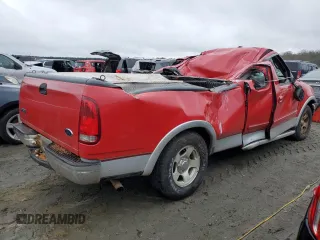 1999 Ford F-150 with VIN 1FTRX17W3XNA26575, listed as a Copart auction lot 81508484 with 138,704 mi miles and Salvage title. Bid and sale history available at DreamBid. Image 3.