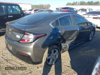 2017 Chevrolet Volt LT with VIN 1G1RA6S55HU174692, listed as a IAAI auction lot 41698441 with 124,652 mi miles. Bid and sale history available at carsss.com. Image 4.