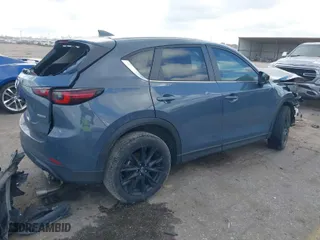 2023 Mazda CX-5 2.5 S Carbon Edition with VIN JM3KFBCM5P0257027, listed as a IAAI auction lot 41491942 with 42,958 mi miles. Bid and sale history available at carsss.com. Image 4.