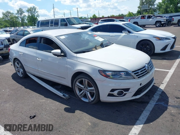 2014 Volkswagen CC R-Line with VIN WVWBP7AN7EE501064, listed as a IAAI auction lot 42220870 with Not provided miles and . Bid and sale history available at DreamBid. Image 1.
