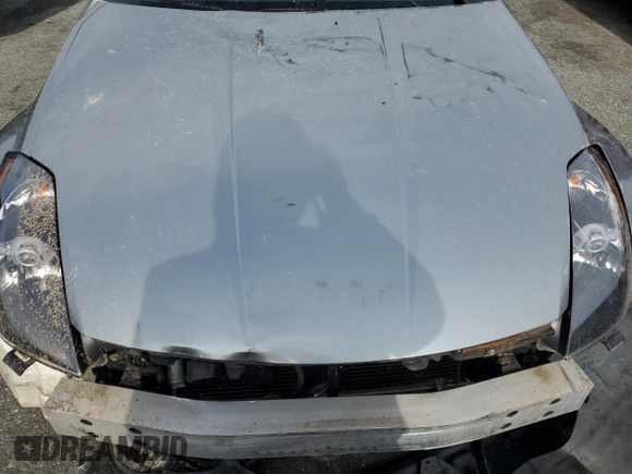 2004 Nissan 350Z Touring z VIN JN1AZ36A44M253626, wystawiony jako Copart lot #79089504 z przebiegiem 138 345 mil mil oraz Szkoda całkowita • Salvage title. Historia ofert i sprzedaży dostępna na DreamBid. Obrazek 11.