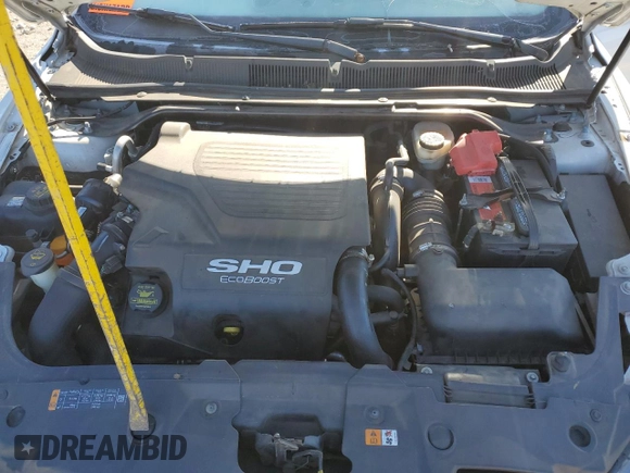 2013 Ford Taurus SHO z VIN 1FAHP2KT1DG211566, wystawiony jako Copart lot #82433574 z przebiegiem 157 649 mil mil oraz Szkoda całkowita • Salvage title. Historia ofert i sprzedaży dostępna na DreamBid. Obrazek 12.