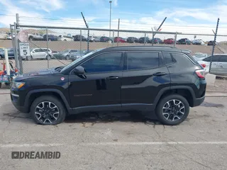2020 Jeep Compass Trailhawk with VIN 3C4NJDDB7LT129673, listed as a IAAI auction lot 41811055 with 30,106 mi miles and . Bid and sale history available at carsss.com. Image 14.