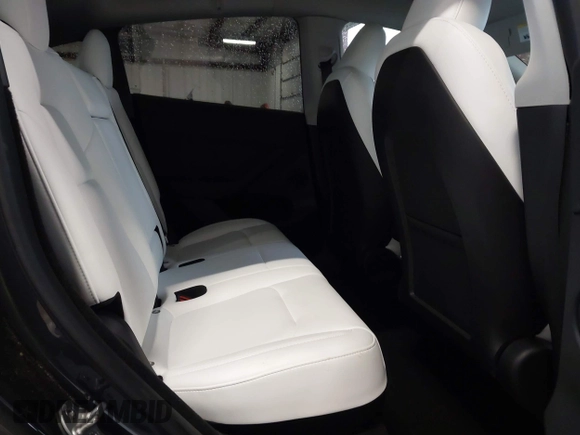 2024 Tesla Model Y Performance with VIN 7SAYGDEFXRF049338, listed as a IAAI auction lot 41240812 with 10,132 mi miles and . Bid and sale history available at DreamBid. Image 8.