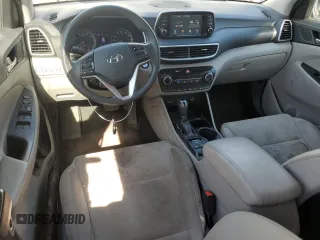 2019 Hyundai Tucson Value z VIN KM8J33A4XKU956155, wystawiony jako Copart lot #53487735 z przebiegiem 84 453 mil mil oraz Czysty tytuł • Clean title. Historia ofert i sprzedaży dostępna na DreamBid. Obrazek 8.