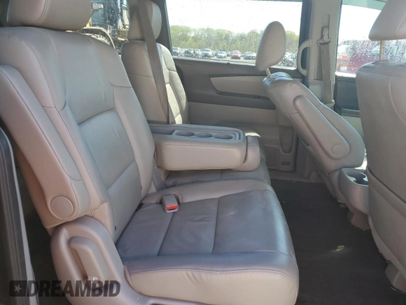 2014 Honda Odyssey Touring with VIN 5FNRL5H99EB088859, listed as a Copart auction lot 54828555 with 147,147 mi miles and Salvage Title. Bid and sale history available at DreamBid. Image 11.