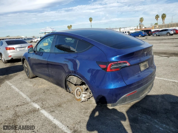 2023 Tesla Model Y Long Range with VIN 7SAYGDEEXPF814469, listed as a Copart auction lot 45982675 with 52,053 mi miles and Salvage Title. Bid and sale history available at carsss.com. Image 2.