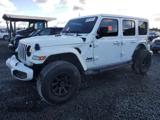 2020 Jeep Wrangler Unlimited Sahara Altitude with VIN 1C4HJXEG2LW319304, listed as a Copart auction lot 88274015 with 50,599 mi miles and Salvage title. Bid and sale history available at DreamBid. Image 1.