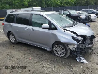 2011 Toyota Sienna XLE AAS z VIN 5TDYK3DC1BS165154, wystawiony jako Copart lot #57044235 z przebiegiem 232 461 mil mil oraz Szkoda całkowita • Salvage title. Historia ofert i sprzedaży dostępna na DreamBid. Obrazek 4.