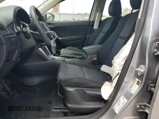 2014 Mazda CX-5 Sport with VIN JM3KE2BE1E0402185, listed as a Copart auction lot 52313675 with 140,398 mi miles and Salvage Title. Bid and sale history available at carsss.com. Image 7.