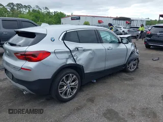 2019 BMW X2 sDrive28i z VIN WBXYJ3C51KEP77367, wystawiony jako IAAI lot #41984890 z przebiegiem 65 117 mil mil oraz . Historia ofert i sprzedaży dostępna na DreamBid. Obrazek 4.