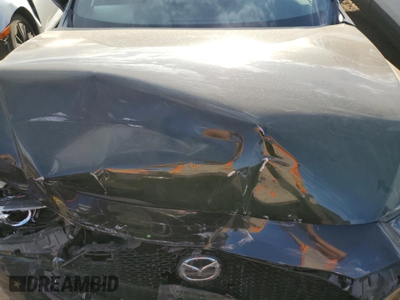 2020 Mazda 3 Preferred with VIN JM1BPBMM1L1158097, listed as a Copart auction lot 73256024 with 25,635 mi miles and Salvage title. Bid and sale history available at DreamBid. Image 12.
