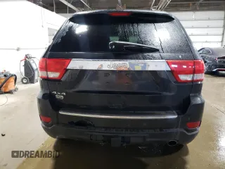 2013 Jeep Grand Cherokee Overland with VIN 1C4RJFCG7DC646348, listed as a Copart auction lot 49526415 with 137,889 mi miles and Clean Title. Bid and sale history available at carsss.com. Image 6.