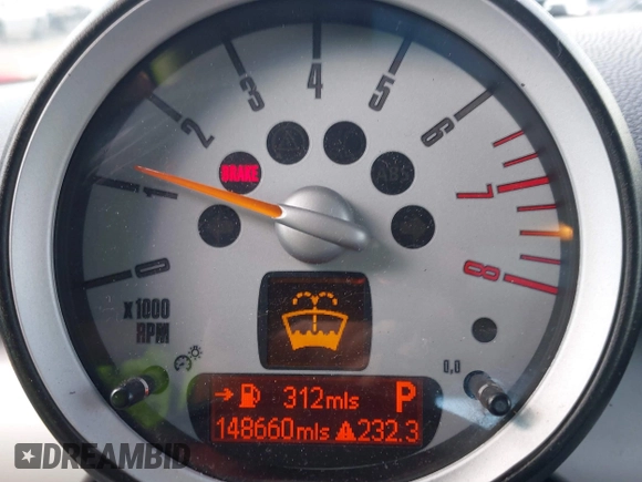 2009 MINI Hardtop with VIN WMWMF335X9TW71208, listed as a IAAI auction lot 41535653 with 148,660 mi miles and . Bid and sale history available at DreamBid. Image 7.