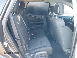 2019 Dodge Journey SE with VIN 3C4PDCBB2KT873970, listed as a IAAI auction lot 41864725 with 91,240 mi miles and . Bid and sale history available at DreamBid. Image 8.