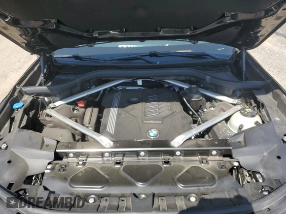 2022 BMW X7 xDrive40i z VIN 5UXCW2C07N9L74738, wystawiony jako Copart lot #53938795 z przebiegiem Nie podano mil oraz Szkoda całkowita • Salvage title. Historia ofert i sprzedaży dostępna na DreamBid. Obrazek 12.