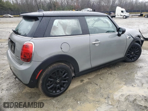 2021 MINI Hardtop Cooper with VIN WMWXR3C04M2N98103, listed as a Copart auction lot 42589255 with 61,317 mi miles and Salvage title. Bid and sale history available at DreamBid. Image 3.