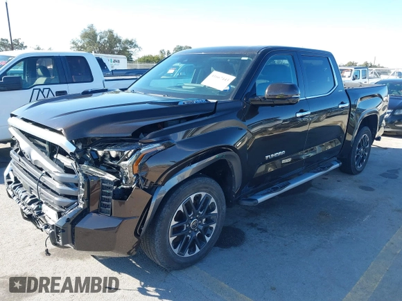 2023 Toyota Tundra Limited Hybrid with VIN 5TFJC5DB7PX032210, listed as a IAAI auction lot 41667443 with 18,390 mi miles and . Bid and sale history available at DreamBid. Image 18.
