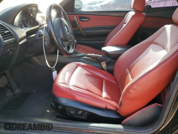 2010 BMW 1 Series 128i with VIN WBAUN1C58AVH82133, listed as a Copart auction lot 63510573 with Not provided miles and Salvage title. Bid and sale history available at DreamBid. Image 7.