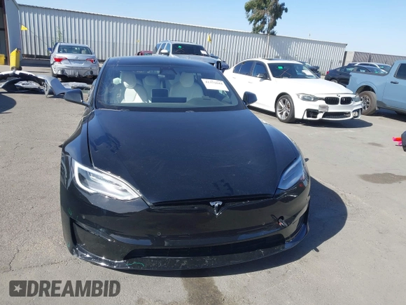 2022 Tesla Model S Plaid with VIN 5YJSA1E62NF460634, listed as a IAAI auction lot 41372644 with 16,050 mi miles and . Bid and sale history available at DreamBid. Image 12.