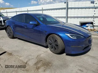 2023 Tesla Model S with VIN 5YJSA1E58PF531121, listed as a Copart auction lot 63683355 with Not provided miles and Salvage title. Bid and sale history available at DreamBid. Image 4.