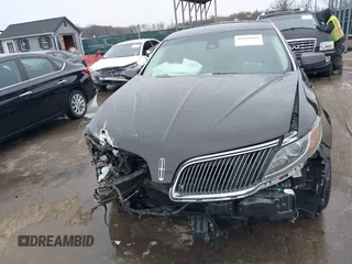2014 Lincoln MKS with VIN 1LNHL9EK7EG609329, listed as a IAAI auction lot 41555819 with 89,849 mi miles. Bid and sale history available at carsss.com. Image 12.