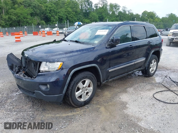 2011 Jeep Grand Cherokee Laredo with VIN 1J4RR4GG8BC543468, listed as a IAAI auction lot 42431481 with 224,639 mi miles and . Bid and sale history available at DreamBid. Image 2.