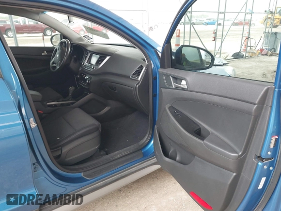 2018 Hyundai Tucson Sport with VIN KM8J33AL0JU803368, listed as a IAAI auction lot 41937235 with 64,163 mi miles and . Bid and sale history available at DreamBid. Image 5.