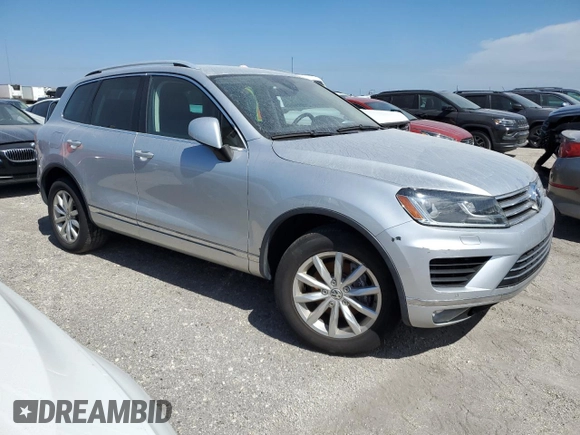 2017 Volkswagen Touareg Sport with VIN WVGEF7BP4HD003359, listed as a Copart auction lot 74714594 with Not Provided miles and Salvage Title. Bid and sale history available at DreamBid. Image 4.