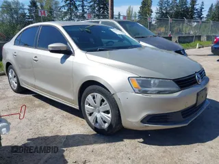 2014 Volkswagen Jetta Sedan SE with VIN 3VWD17AJ1EM270841, listed as a IAAI auction lot 42063625 with 101,481 mi miles. Bid and sale history available at carsss.com. Image 1.