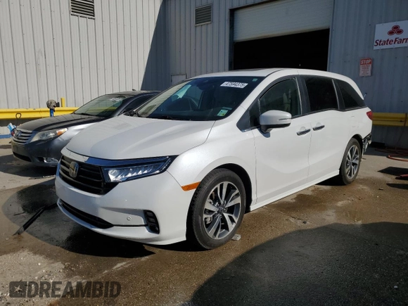 2023 Honda Odyssey Touring with VIN 5FNRL6H80PB024709, listed as a Copart auction lot 47594375 with Not Provided miles and Salvage Title. Bid and sale history available at DreamBid. Image 1.