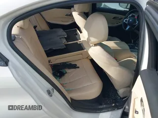 2019 BMW 3 Series 330i with VIN WBA5R1C53KAK08179, listed as a IAAI auction lot 42010397 with 71,975 mi miles and . Bid and sale history available at DreamBid. Image 8.