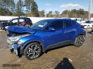 2022 Toyota C-HR XLE with VIN NMTKHMBX0NR141575, listed as a Copart auction lot 89013395 with NaN miles and Salvage Title. Bid and sale history available at carsss.com. Image 1.