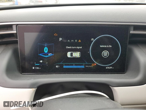 2022 Hyundai Tucson SEL z VIN 5NMJF3AE8NH060209, wystawiony jako Copart lot #57299575 z przebiegiem 67 639 mil mil oraz Szkoda całkowita • Salvage title. Historia ofert i sprzedaży dostępna na DreamBid. Obrazek 9.