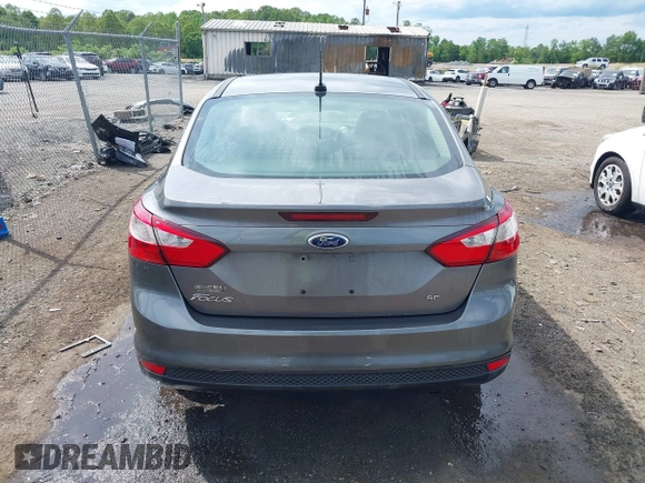 2013 Ford Focus SE z VIN 1FADP3F24DL104718, wystawiony jako IAAI lot #42206680 z przebiegiem Nie podano mil oraz . Historia ofert i sprzedaży dostępna na DreamBid. Obrazek 16.