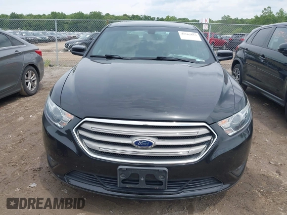 2015 Ford Taurus SEL with VIN 1FAHP2E80FG192017, listed as a IAAI auction lot 42562853 with 124,348 mi miles and . Bid and sale history available at DreamBid. Image 12.