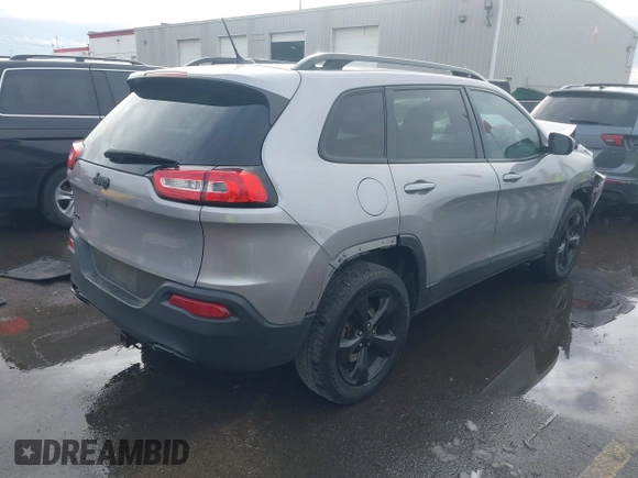 2018 Jeep Cherokee Latitude with VIN 1C4PJMCX4JD548136, listed as a IAAI auction lot 41592821 with 165,022 mi miles and . Bid and sale history available at DreamBid. Image 4.